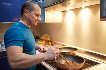 Man cooking at home