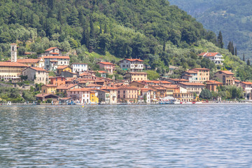 Fototapeta na wymiar Little town on the lake Como, Italy