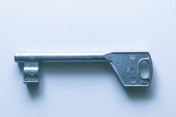 Iron Key isolated on white background. Key to success, key to happiness, key to the heart, unlock the door, open to new horizons