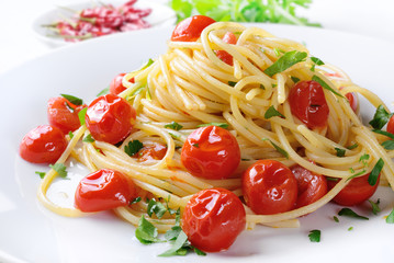 Pasta with cherry tomatoes, garlic, oil, chilli pepper and parsley