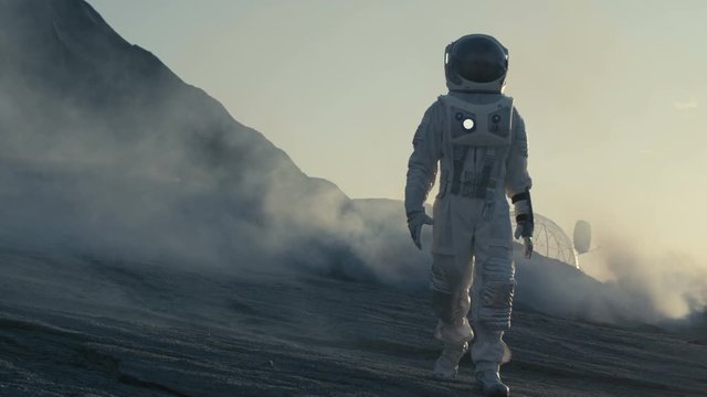 Proud Astronaut Confidently Explores Alien Planet's Surface. Cold Planet Covered in Gas and rock,  People Overcoming Difficulties, Important Moment for the Human Race. 