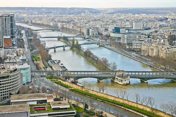 aerial view of seine river, bridges, and cityscape paris france