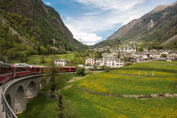 clean train Switzerland to Italy in the town of Brusio with the snail with the company bernina express