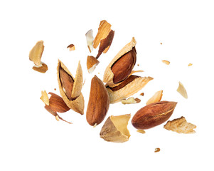 Almonds is torn to pieces isolated on white background