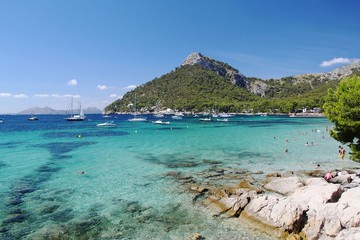 Spain. Palma de Majorca. Blue water of Mediterranean  sea. Fantastic view on beach. Beautiful background.