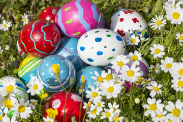 Colorful easter eggs on grass