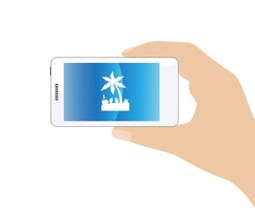 Vacances à la plage dans un téléphone mobile tenu en main