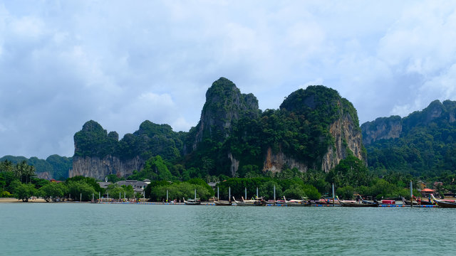 scenic view of sea and rock formation against sky