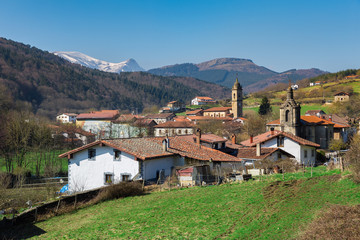Fototapeta na wymiar Typical Basque landscape of its snowy valleys and mountains, Ubidea, Spain