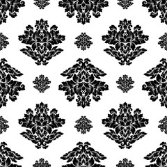 Damask seamless pattern intricate design. Luxury royal ornament, victorian texture for wallpapers, textile, wrapping. Exquisite floral baroque lacy flourish in black and white monochrome colors
