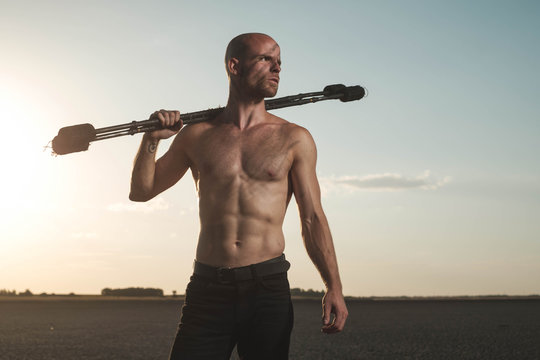 Portrait Of Acrobat Man In The Desert