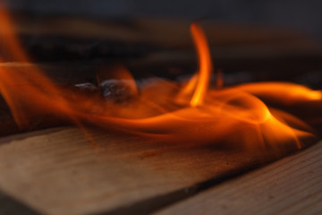 Glowing hot charcoal briquettes close-up background texture. bonfire