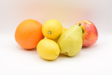 Citrus fruits arranged on a white background. 