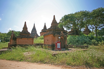 Small ancient religious brick buildings in Bagan, Myanmar
