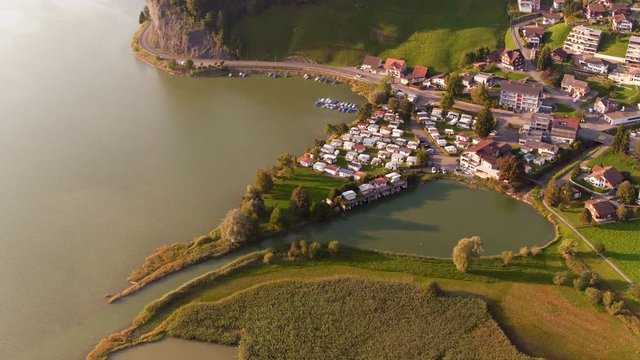 Aerial view in the foothills of Switzerland with lake Sihlsee and little village Euthal