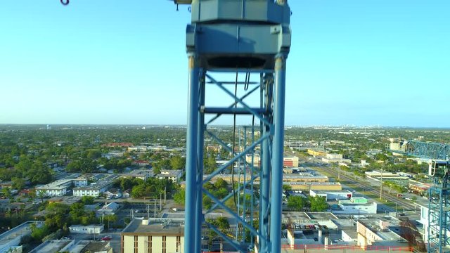 Aerial flyover and tilt down reveal crane 4k
