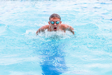 Fototapeta na wymiar Breaststroke swimmer