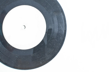 old dusty vinyl record on white background and place for text
