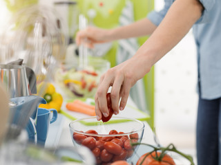 Woman preparing a fresh healthy salad