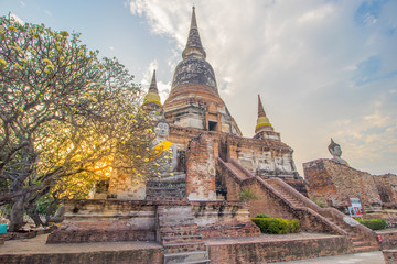 Fototapeta na wymiar The Pagoda and Buddha Status at Wat Yai Chaimongkol, Ayutthaya,