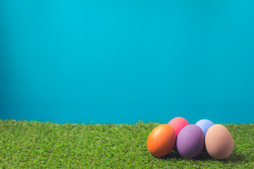 Easter eggs on the green grass.