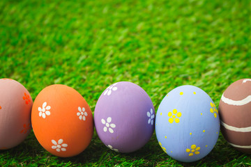 Easter eggs on the green grass.