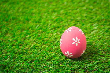Easter eggs on the green grass.