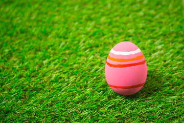 Easter eggs on the green grass.