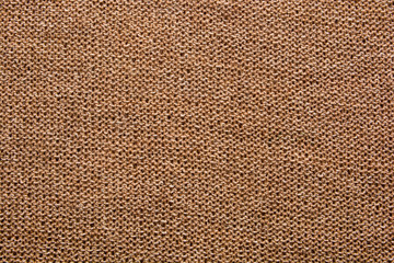 The texture of brown knit fabric background  