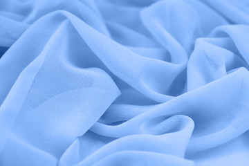 Texture chiffon fabric blue color for backgrounds  