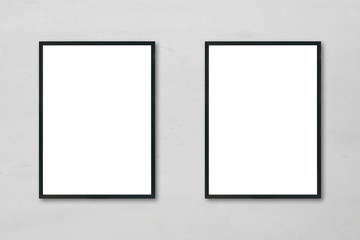 Mock up blank poster picture frame hanging on white marble wall background in room - can be used mockup for montage products display and design key visual layout.