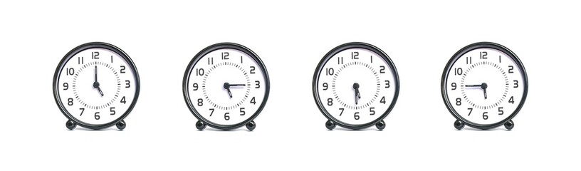 Closeup group of alarm clock for decoration show the time in 5 , 5:15 , 5:30 , 5:45 p.m. isolated...