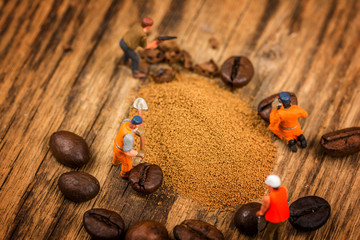 Figures working on coffee