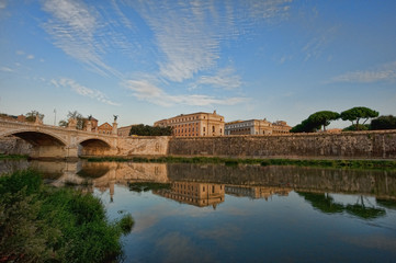 Fototapeta premium Building and Bridge Reflected on River