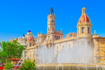 Fototapeta na wymiar Fountain on Modernism Plaza of the City Hall of Valencia, Town h