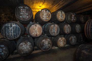 Port wine barrels in cellar, Vila Nova de Gaia, Porto, Portugal © javarman