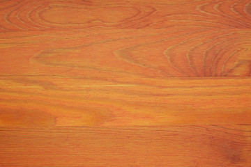 Brown-orange natural pine wood texture windowsill as background.