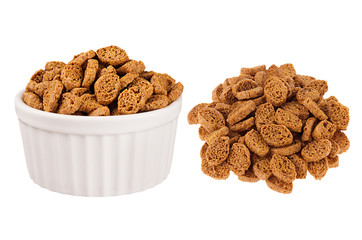 Set of brown rye croutons as heap and in ceramics bowl isolated on white background. Fast food template for menu, advertising, cover.
