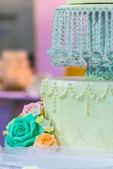 Sweet wedding cupcakes./ Sweet beauty flower and topping pastel color on wedding cake decoration.