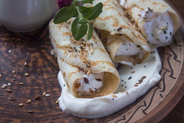 three swirled French pancakes with sweet cottage cheese