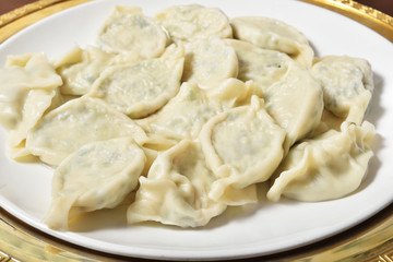 Fototapeta na wymiar Boiled dumplings on the plate 