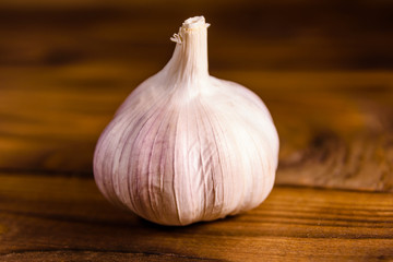 Ripe garlic on a rustic wooden table