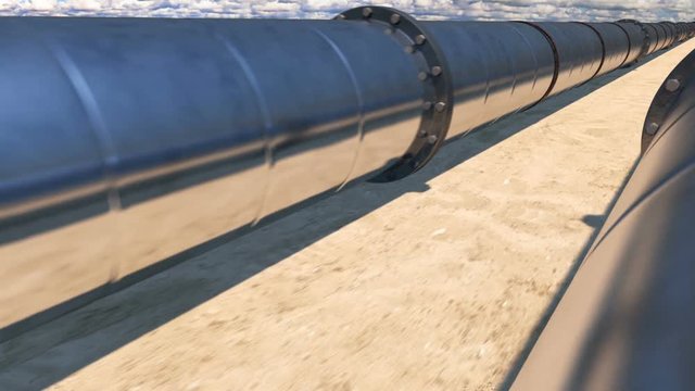 Loop: 2 oil pipelines in desert, angle view