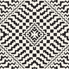 Seamless ethnic and tribal pattern. Hand drawn ornamental stripes. Black and white print. Vector geometric background.