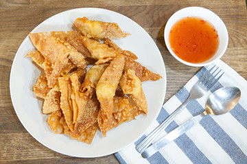 Deep Fried Wonton or dumpling on white dish