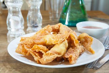 Deep Fried Wonton or dumpling on white dish