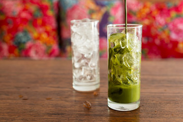 glass of iced matcha green tea latte