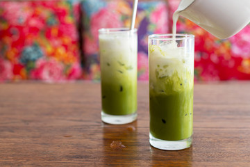 glass of iced matcha green tea latte