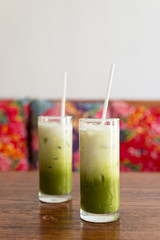 glass of iced matcha green tea latte