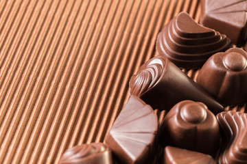 assorted chocolates on brown